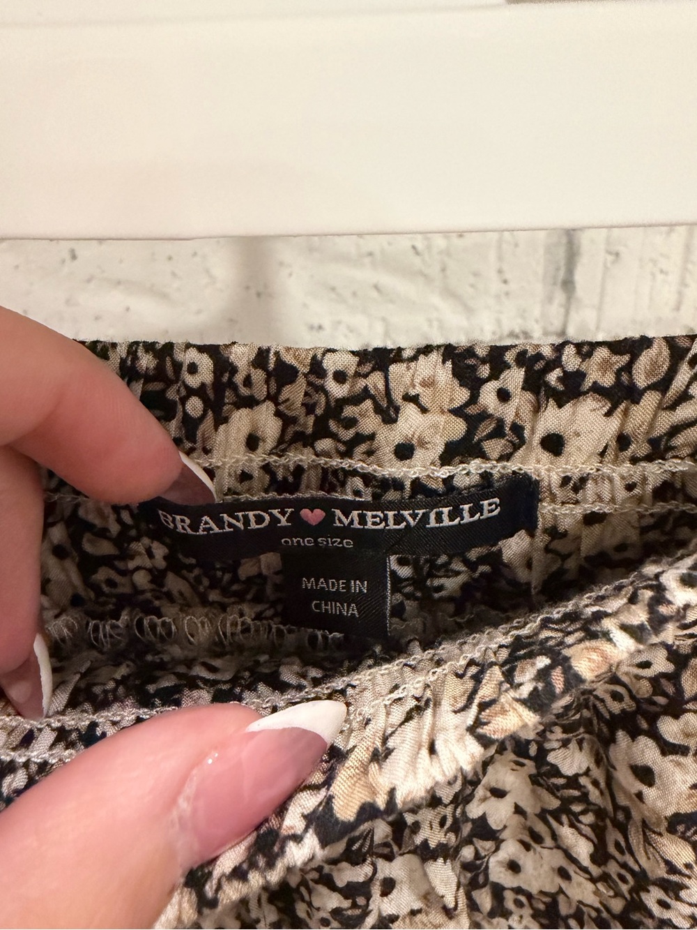 Brandy Melville Floral Smocked Waist Mini Skirt in Black and Cream - Picture 2 of 2